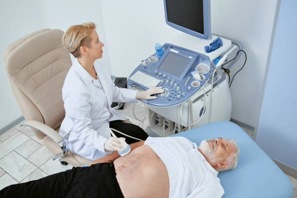 istock Doctor observing man with modern med device. 1135567302
