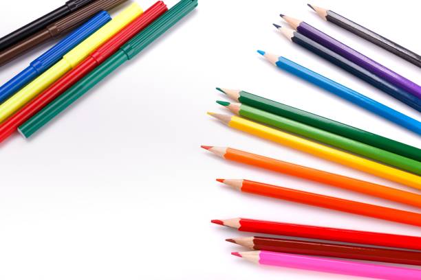 istock colored pencils and markers on white background 1135568298
