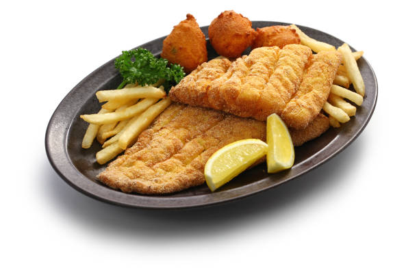südgebratene fischplatte - cod fillet fried prepared fish stock-fotos und bilder