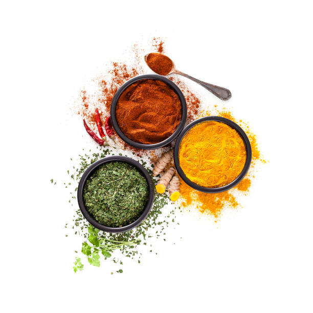 スパイス: ウコン、コショウパウダー、ドライパセリを白の背景に上から撮影 - spice herb ingredient curry powder ストックフォトと画像