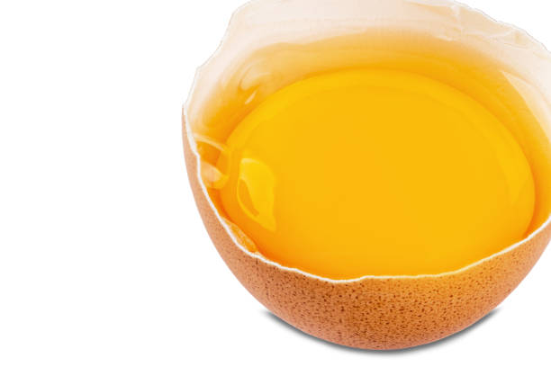 istock Raw chicken eggs on a white background. Eggs close-up for designers. 1135572222