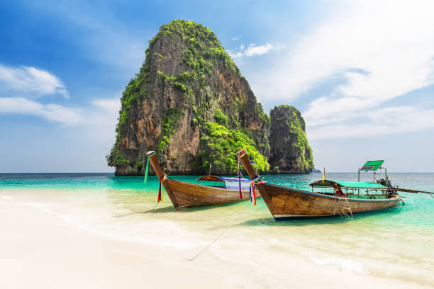 istock Thai traditional wooden longtail boat 1135575001