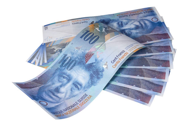 istock Banknotes of one hundred Swiss francs on white background 1135577474