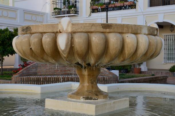 istock Stone fountain in plaza 1135578915