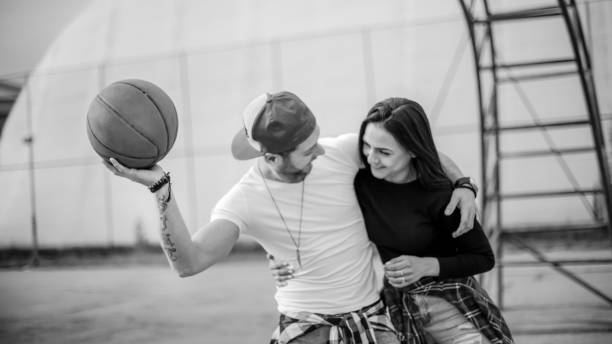 istock Couple having fun on basketball 1135578972