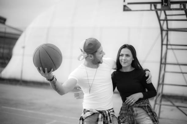 istock Couple having fun on basketball 1135579020