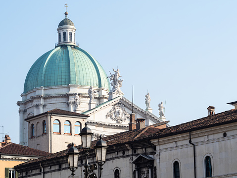 Travel to Italy - view of dome Duomo Nuovo (The New Cathedral) from square Piazza Loggia in Brescia city, Lombardy