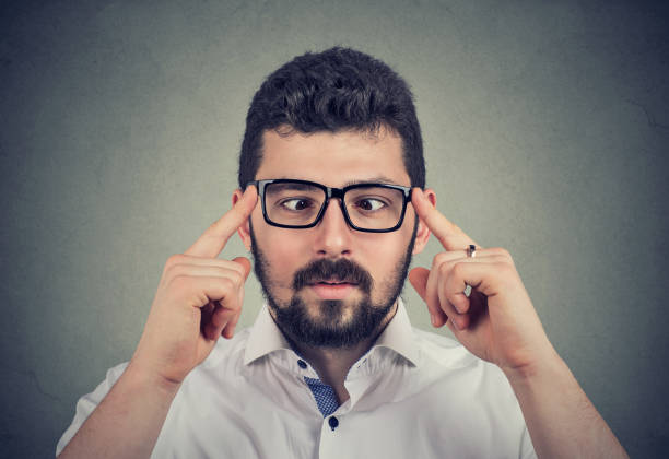 istock Man in glasses with strabismus 1135580144