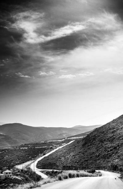 Distance view of a road going around the mountains Crete Greece Europe