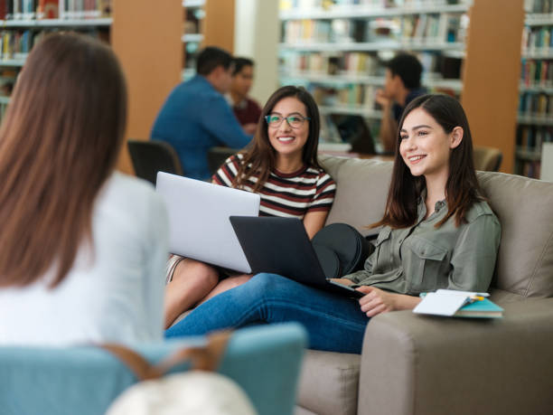istock Friendly female college students 1135584035