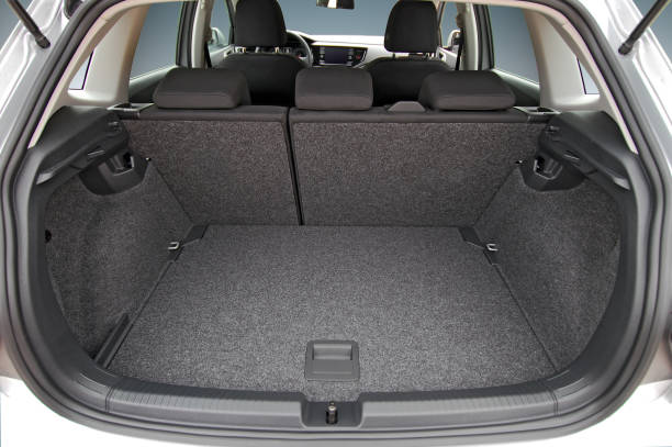 car trunk Empty trunk of the small passenger car car back open stock pictures, royalty-free photos & images