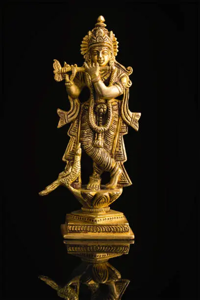 Photo of Krishna statue on white