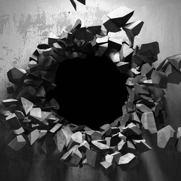 istock Dark cracked broken hole in concrete wall 1135586665