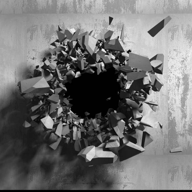 istock Dark cracked broken hole in concrete wall 1135586694