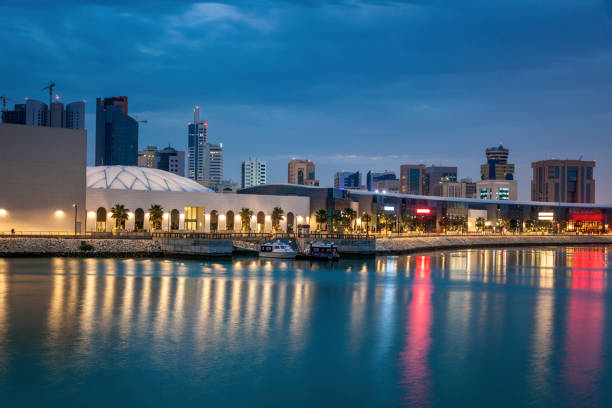 istock Modern architecture of Manama at night 1135595293