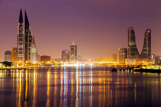 istock Modern architecture of Manama at night 1135595465