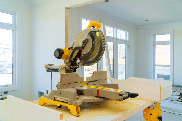 istock Construction remodeling home cutting wooden trim board on with circular saw. 1135595540