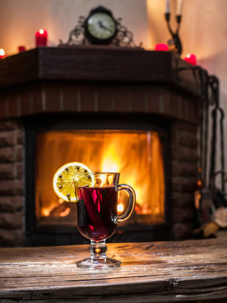 istock Hot mulled wine with orange slice, cloves and cinnamon stick. 1135596417