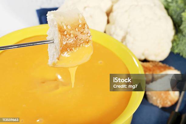 Closeup Of Bread Dipped In Cheese Stock Photo - Download Image Now - Cheese Fondue, Appetizer, Bagel