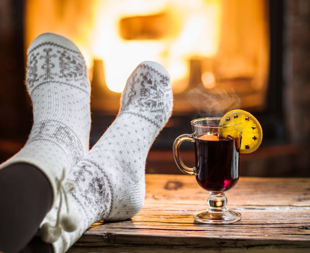 istock Warming and relaxing near fireplace. 1135596841