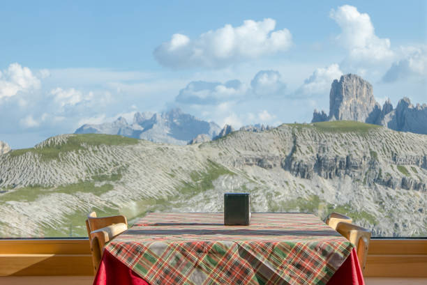 Romantic stylish restaurant table with beautiful view on the mountain range