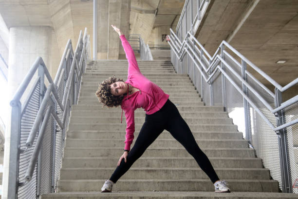 istock Young woman stretching 1135597859
