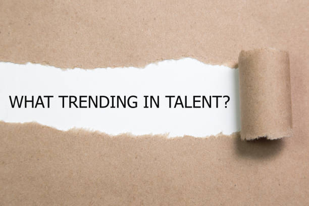 istock WHAT TRENDING IN TALENT? question written under torn paper. - Image 1135601104