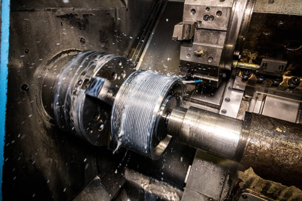 istock Close up of CNC machine at work 1135601709