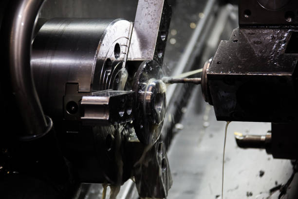 istock Close up of CNC machine at work 1135601716