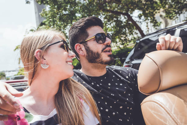 istock Couple inside the moving car 1135603505