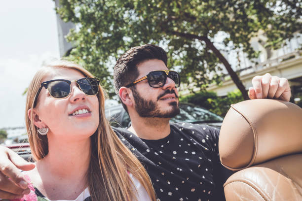 istock Couple inside the moving car 1135603531