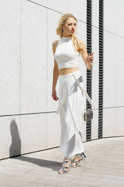 istock Woman wearing crop top and culottes 1135604425