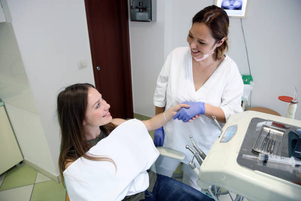 istock Young Patient is Greeting with her Doctor 1135605866