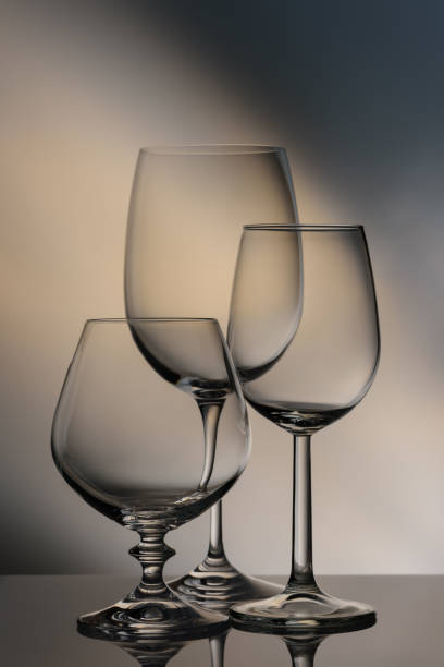 istock Glasses of different heights on a colored background. 1135610912