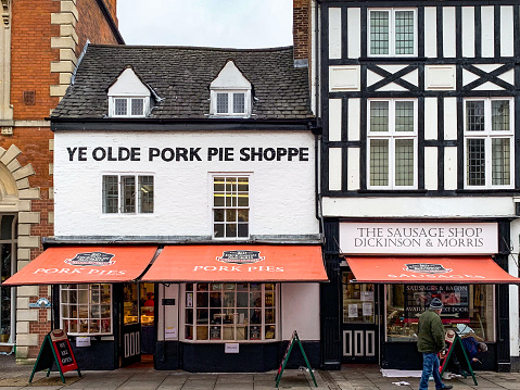 Melton Mowbray, UK. 01 March 2019. The exterior of the famous 'Ye Olde Pork Pie Shoppe' on the high street of Melton Mowbray in Leicestershire. Pork pies have been made here since 1851.
