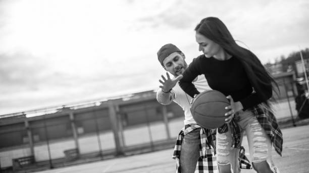 istock Couple having fun on basketball 1135615114