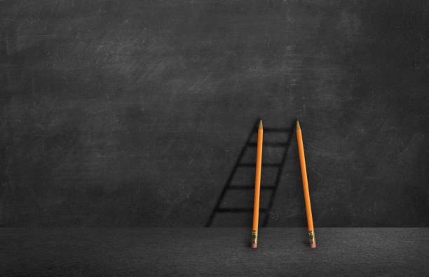 istock pencil staircase on chalkboard.climb to success concept 1135618951