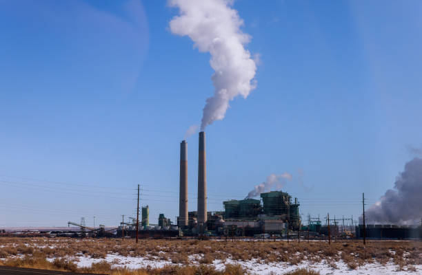 istock Industrial power plant with smokestack 1135621533