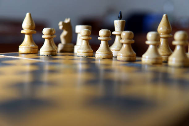 istock Chess figures macro photo in the dark 1135622596