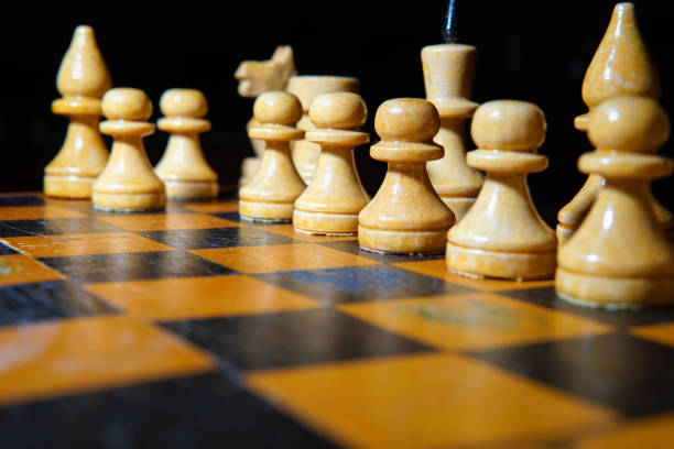 istock Chess figures macro photo in the dark 1135623118
