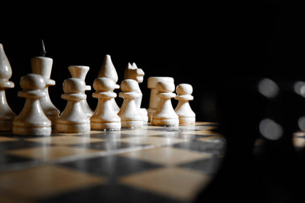 istock Chess figures macro photo in the dark 1135623704
