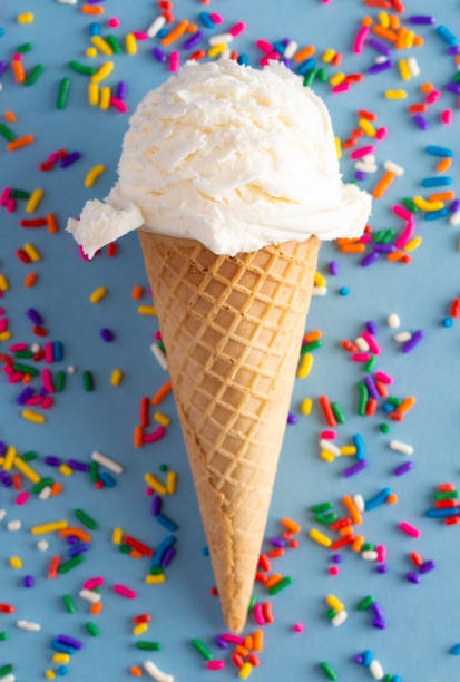 istock A Scoop of Vanilla Ice Cream in a Waffle Cone 1135628448