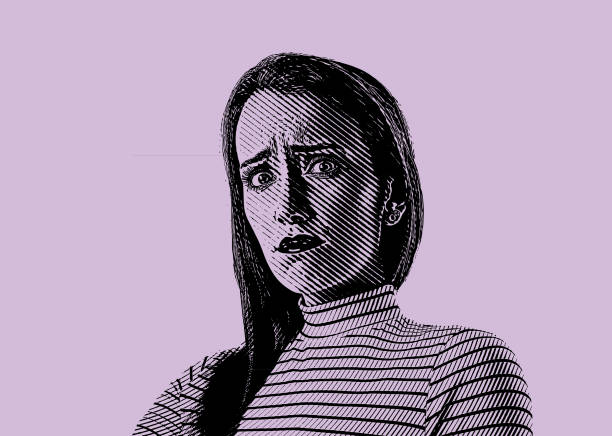 istock Close up of a young woman with stressed out facial expression 1135631619
