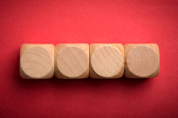 istock Four Blank Wooden Blocks isolated 1135634786