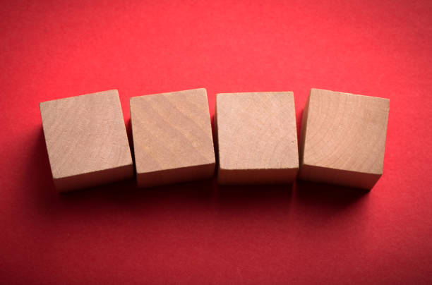 istock Four Blank Wooden Blocks isolated 1135634789
