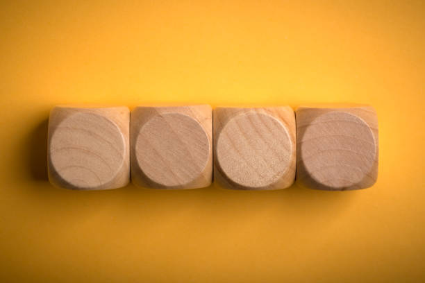 istock Four Blank Wooden Blocks isolated 1135634791