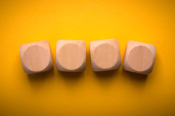 istock Four Blank Wooden Blocks isolated 1135634795