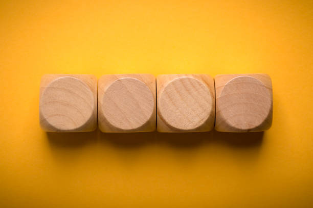 istock Four Blank Wooden Blocks isolated 1135634796