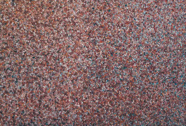 Photo of Texture of a pebble facade