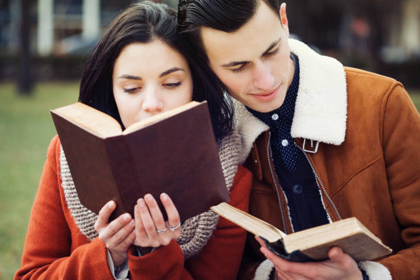 istock Young couple reading books 1135648469